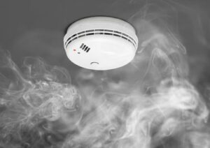 smoke alarm with smoke surrounding